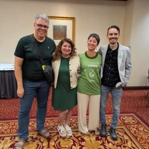 Four chemistry professionals grouped together