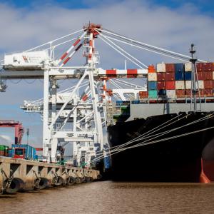 Container ship docked at Terminales Río de la Plata in Buenos Aires, where DP World supports inclusive port operations.