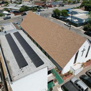 Church and side building with rooftop solar installation.
