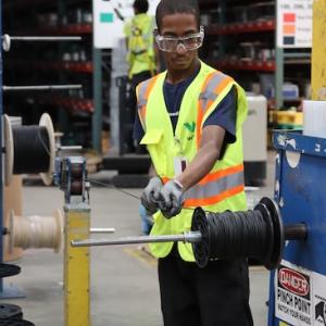 Charles Davis, one of the first graduates of Aspire’s new Employment Training Program, at work at Wesco.