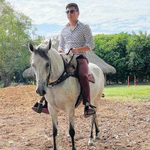 Austin riding a horse