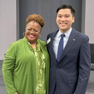 Two people dressed formally 