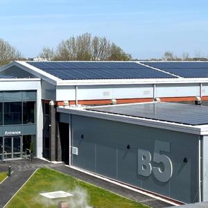 exterior of large two-story building. "B5" on the side