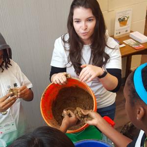 Bristol Myers Squibb‘s Kristen Petitjean led a soil study during this pre-COVID “Science Saturdays” program, in partnership with Mercer County 4-H. Led by volunteers from the company to stimulate STEM interests in young students through hands-on experiments, the program has been running for eight years, targeting greater Trenton, NJ, and surrounding areas.