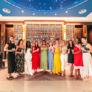 Group of people standing in a room