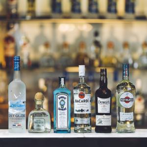 Bacardi products lined up on a bar