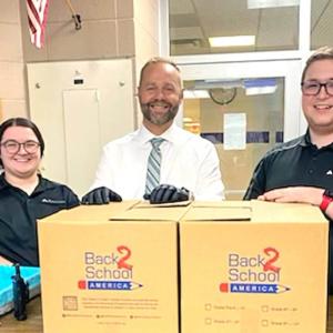 people with supply boxes