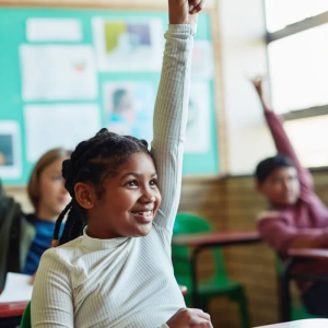 child raising her hand