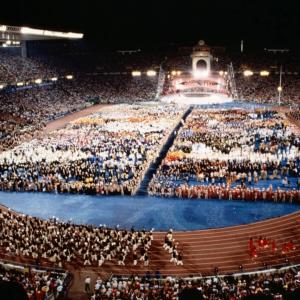 Aerial view of all the athletes at the opening ceremony of 1992 Barcelona olympics. A  huge stadium filled with people and spectators.