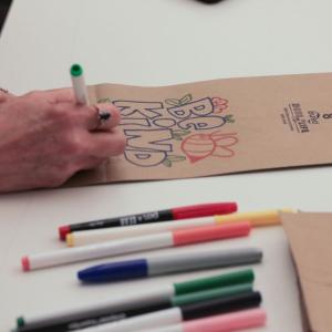 A person drawing on paper 