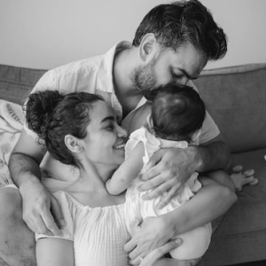 Bhumi, her husband and child.