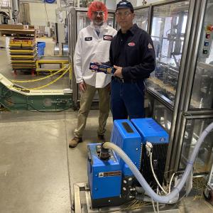 National Grid Energy Efficiency Specialist Jay Snyder and Barilla Plant Manager Bill Boula with new melt unit