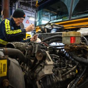 Man working in factory with diesel