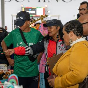 A group of four shoppers at Bacardi's Black-Owned Vendor Market in Bermuda,