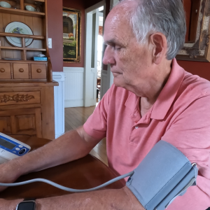 Paul Griffin checks his blood pressure at home