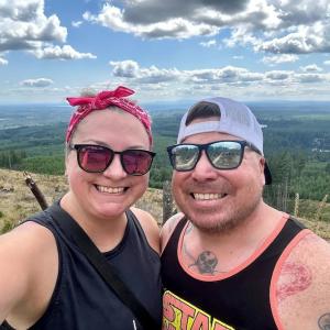 Brian Boosz and his wife shown on a hike. 