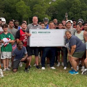 Bridge Lacrosse team receiving a Sports Matter grant.