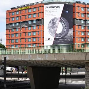 Bridgestone banner on the side of a building 