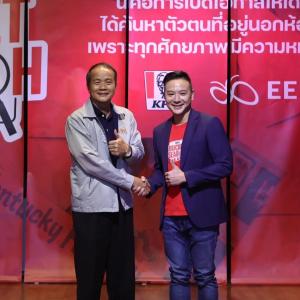 two people shaking hands and smiling