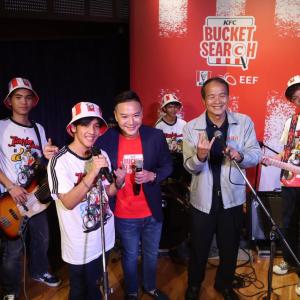 band posing together with instruments