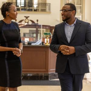 Two people smiling at each other