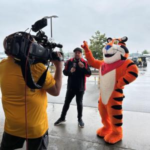 Tony the Tiger hanging out with Jay Towers 