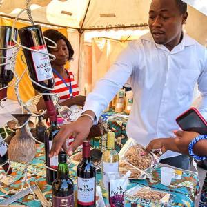 people looking at wine bottle holders