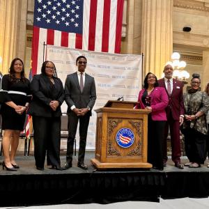 Representatives from the City of Cleveland shown on a stage.