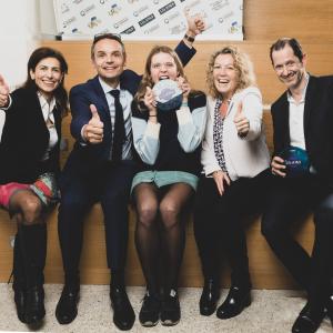 group photo with smiles and thumbs up