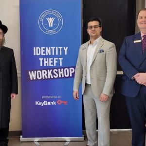 Community Outreach Center Executive Director Rabbi Hersh Horowitz with KeyBank’s Raza Hussain and Gary Wawrzycki.