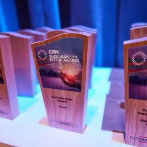 A table full of matching awards. "CRN" at the tops.