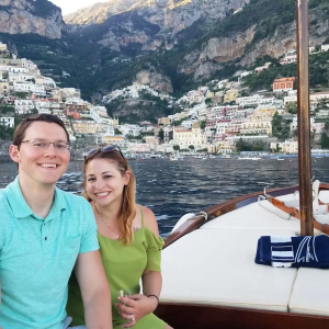 Calvin and his wife on a sailboat in Italy.