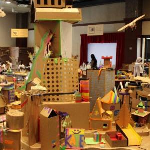 Small buildings made out of cardboard 