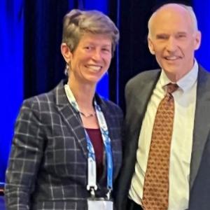 two people on a stage