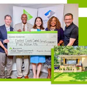 a group of people holding a large check to Center Creek Capital Group