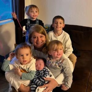 Chrisondra shown with her children.