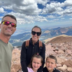 Christine Perkins and her family on a vacation doing a hike.