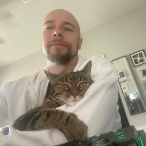 Christopher with his cat.