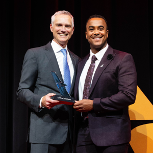 CEO Robert Isom and Kevaughn Hammond