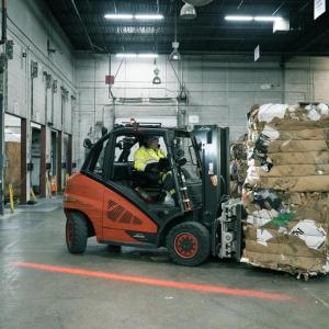 Recycling being loaded on forklift