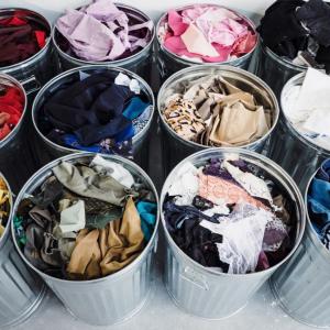 Tin buckets filled with clothing