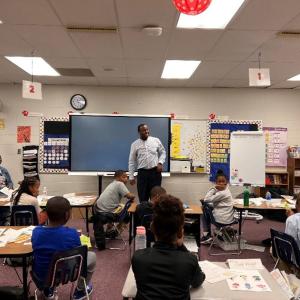 A U.S. Bank volunteer leading a discussion on financial education at Martin Luther King Elementary in Little Rock, Arkansas.