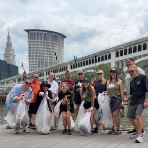 AEG employees helped collect trash at the second annual River Cleanup at Jacob’s Pavilion.