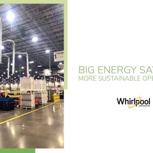 large warehouse with equipment on the left and "Big energy savings more sustainable operations" Whirlpool, on the right.