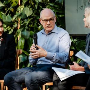 Three people talking together