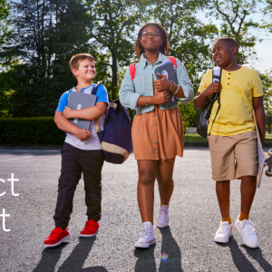 2023 impact report text with 3 school children standing together 