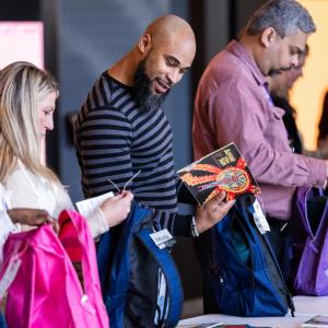 4 people at  Impact week 2023