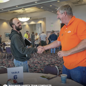 Two people shaking hands