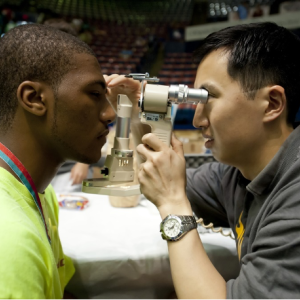 Man performing eye exam 