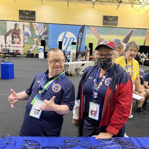 Two Special Olympics participants wearing glasses 